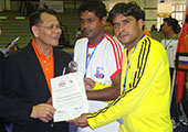 Coach David with Vineet Kumar ( Goal keeper) receiving the semi-final participation certificate after the 7 Nation Tournament